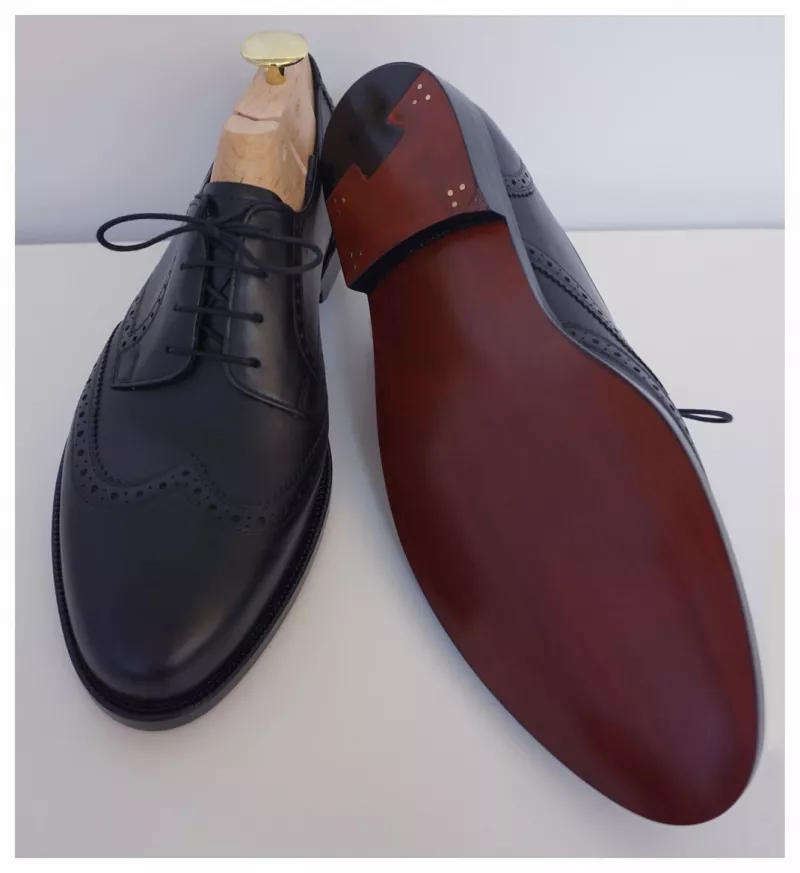 echte-neumann-maßschuhe-obermaterialaus-feinem-schwarzen-kalbs-leder-budapester-konstruktion-und-ausputz-nach-kundenvorgabe